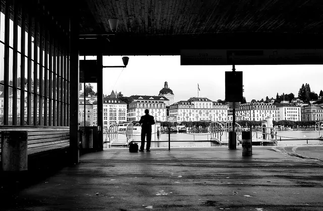 A man with a bag in a ferry station