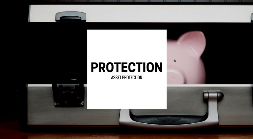 A piggy bank inside of a briefcase with the words Asset Protection on front.