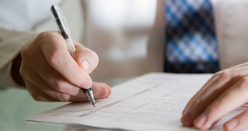 A man filing taxes