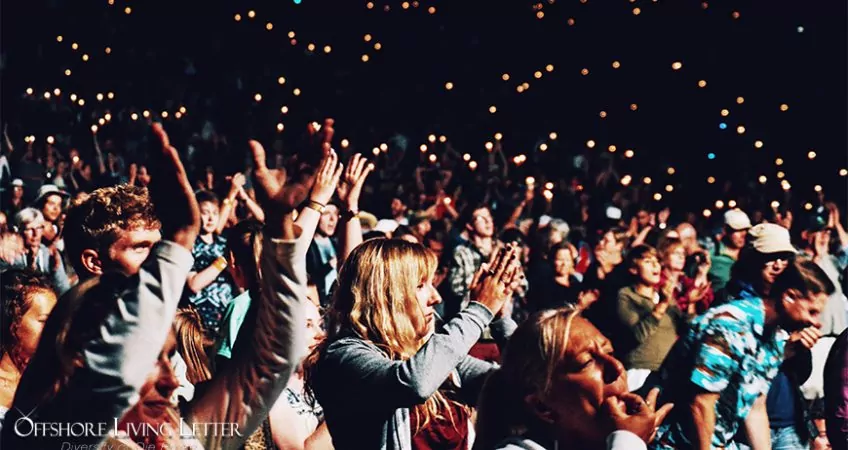 people celebrating at a concert