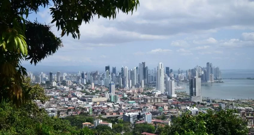 behind panama economy, a view form cerro ancon, the city lanscape and the sea
