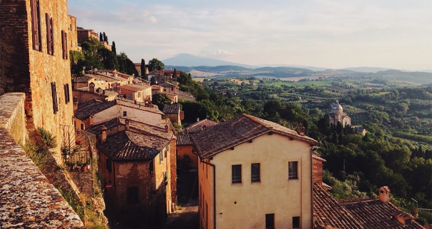 A high-angle view of a village in Abruzzo and the countryside beside it