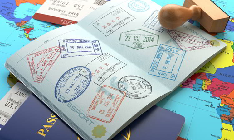 Opened passport with visa stamps