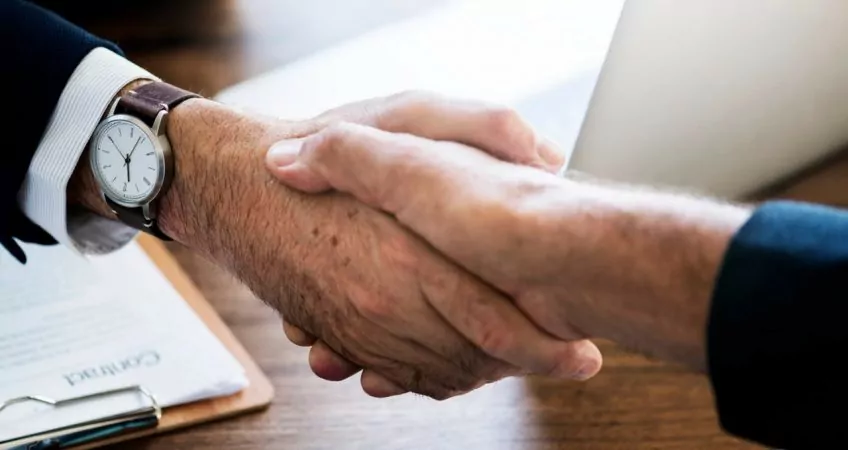 Two men shaking hands