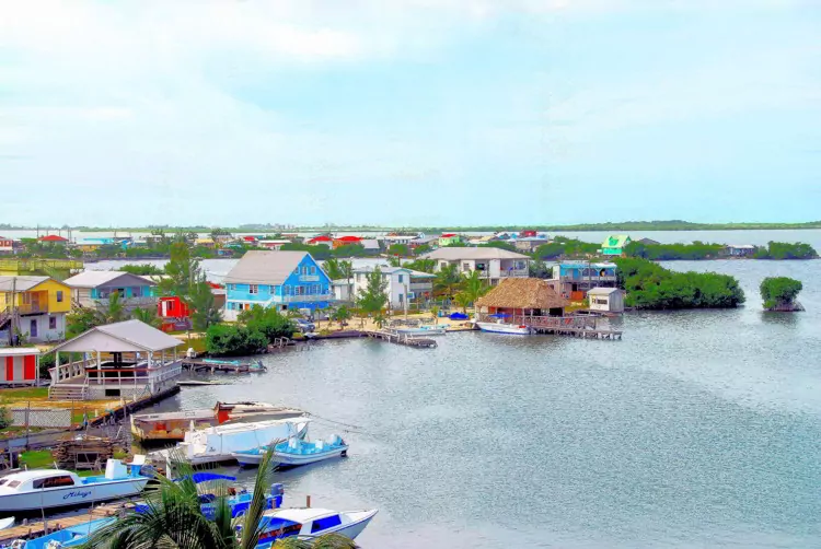 Many homes with boats are built close to the Caribbean Sea on the southern part of Ambergris Caye