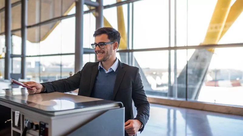 A man going through passport control at an airport