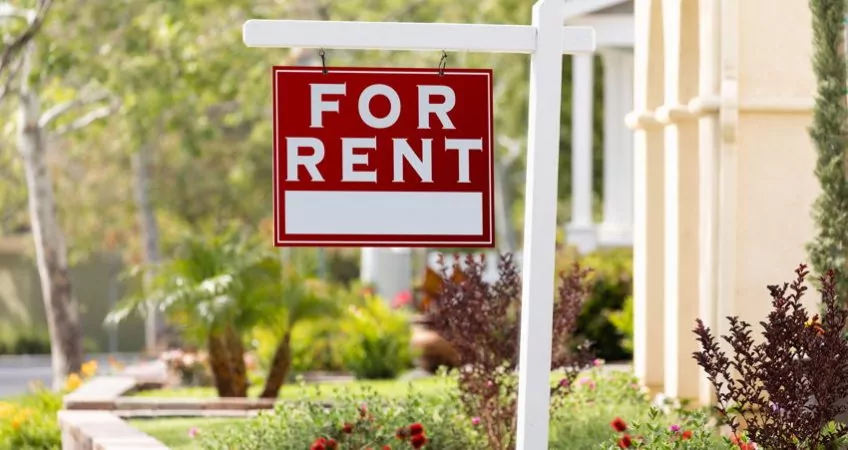 A for rent sign outside a nice property