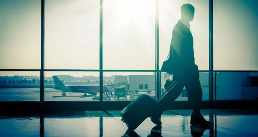 A man walking through an airport