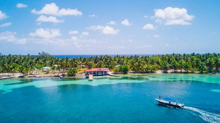 Aerial Drone view of South Water Caye tropical island in Belize barrier reef 