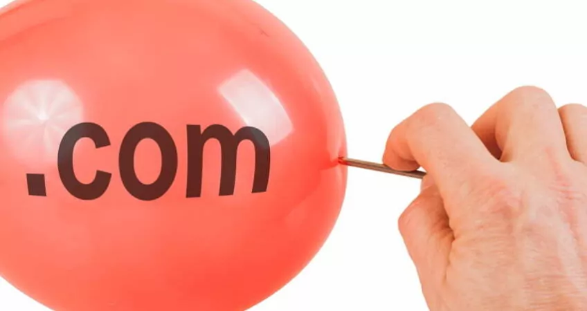 pin about to burst a baloon that says dot com