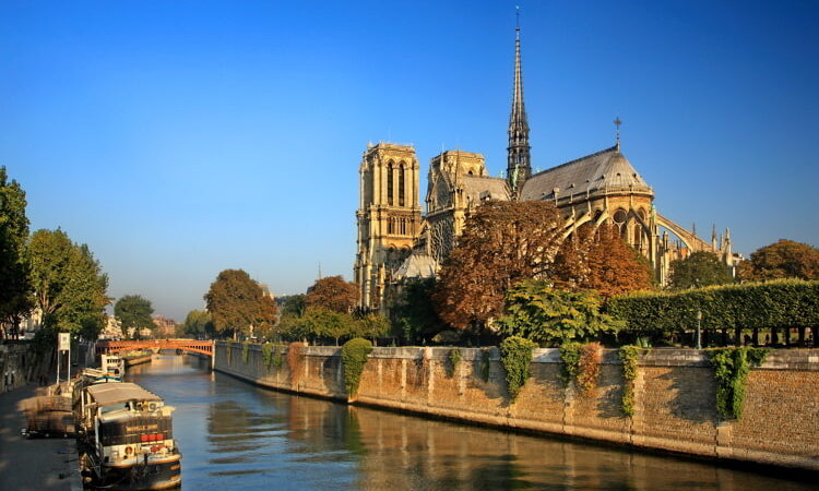 The Notre Dame Cathedral on the Seine river, Paris, France