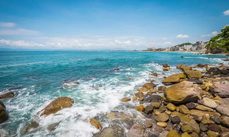 Rocky beach with blue waters in Puerto Vallarta, Jalisco, Mexico.