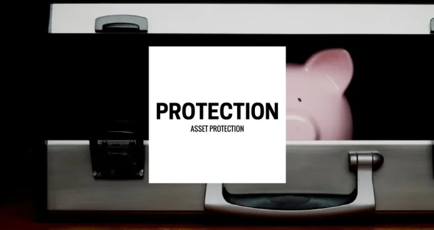 A piggy bank inside of a briefcase with the words Asset Protection on front.