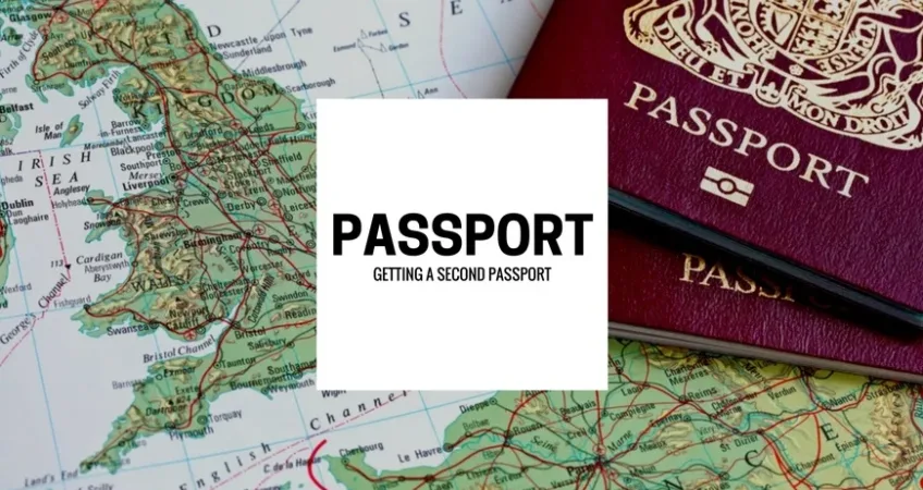 Two passports laying on top of a map.