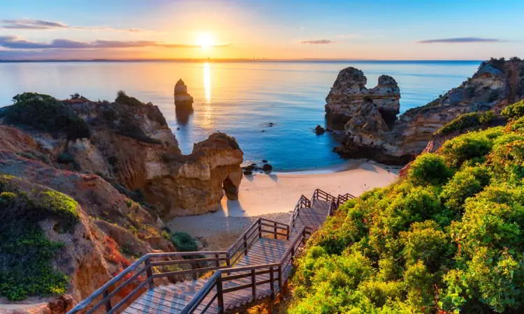 Camilo Beach (Praia do Camilo) at Algarve, Portugal with turquoise sea in background.