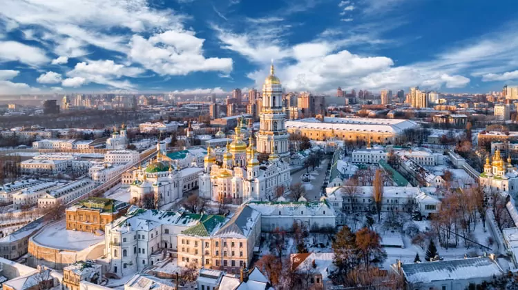 Blue cloudy sky over cityscape Kiev, Ukraine