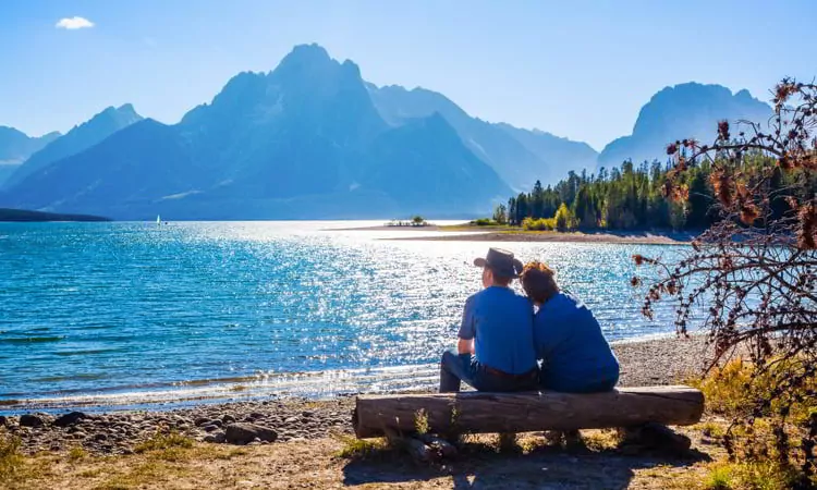 Couple watching the sunset in a beautiful national park