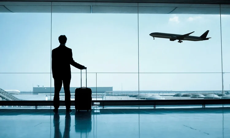 businessman at the airport. Man with luggage